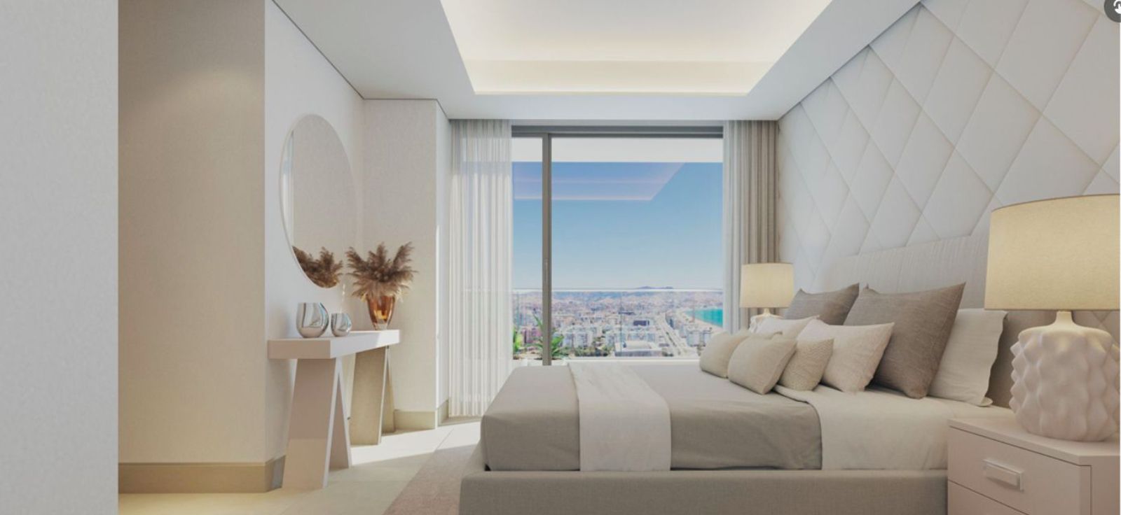Modern bedroom with Malaga city and sea view in Malaga Towers.